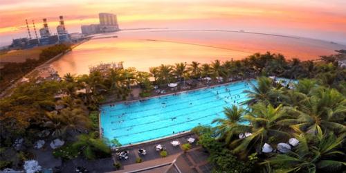 Pengen Sunsetan di Jakarta? Coba ke Pantai Mutiara, Bro!